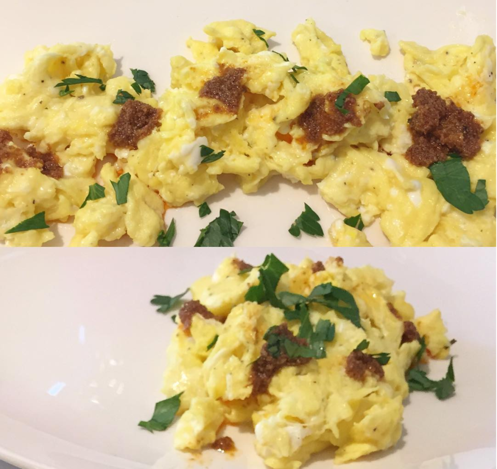 Scrambled eggs with spicy amona mojo pico sauce