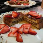 Banana and Nutella Stuffed French Toast with Strawberries